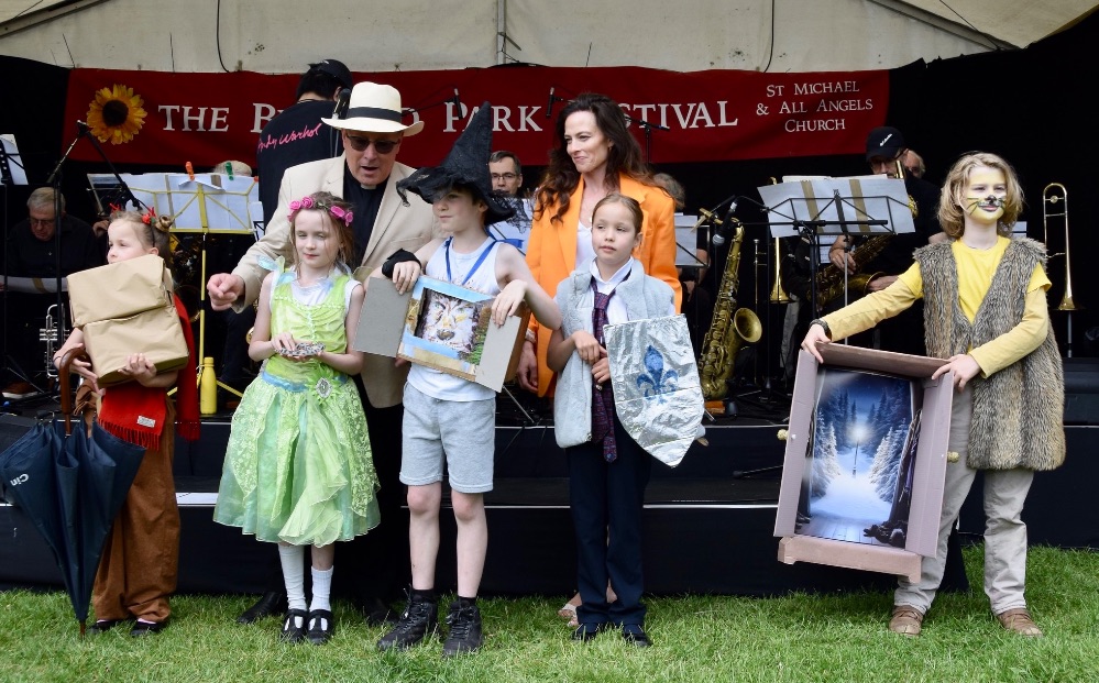 Fancy Dress winners with Fr Kevin Morris and Lara Pulver: Imogen (Mr Tumnus), Ronnie (Green woman and snake), Bart (Lion, Witch & Wardrobe), Ann (Peter), Barty (Lion, Witch & Wardrobe)